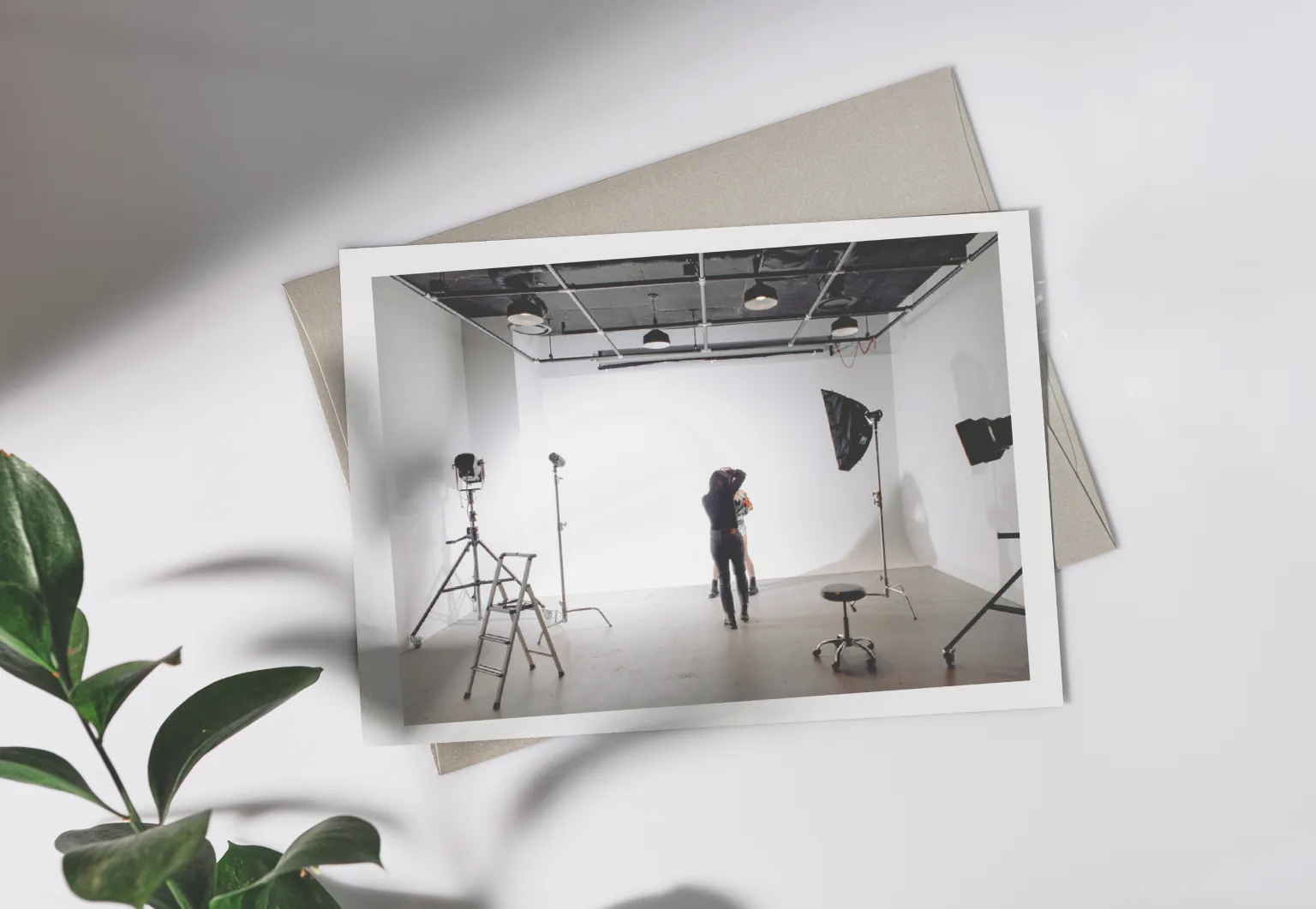 Photographer shooting a model in a studio for Galette Skincare e-commerce photos